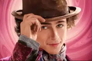 Wonka é vivido por Timothée Chalamet nos cinemas (Foto: Reprodução)